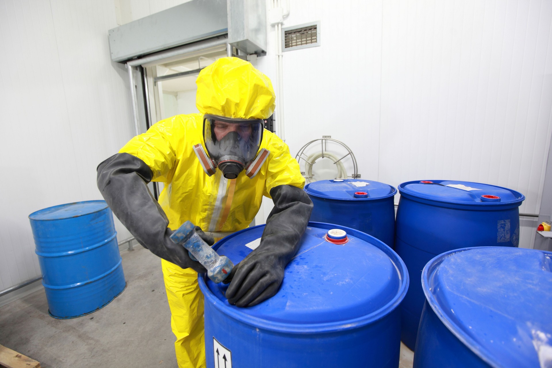 Professional in  uniform dealing with chemicals